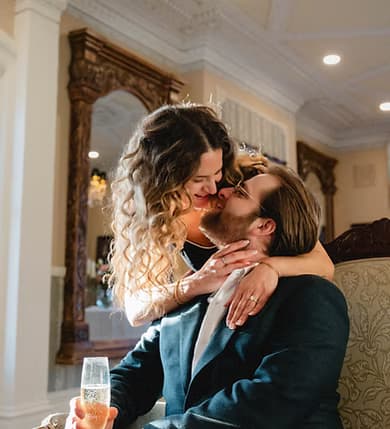 Louis and Camille kissing